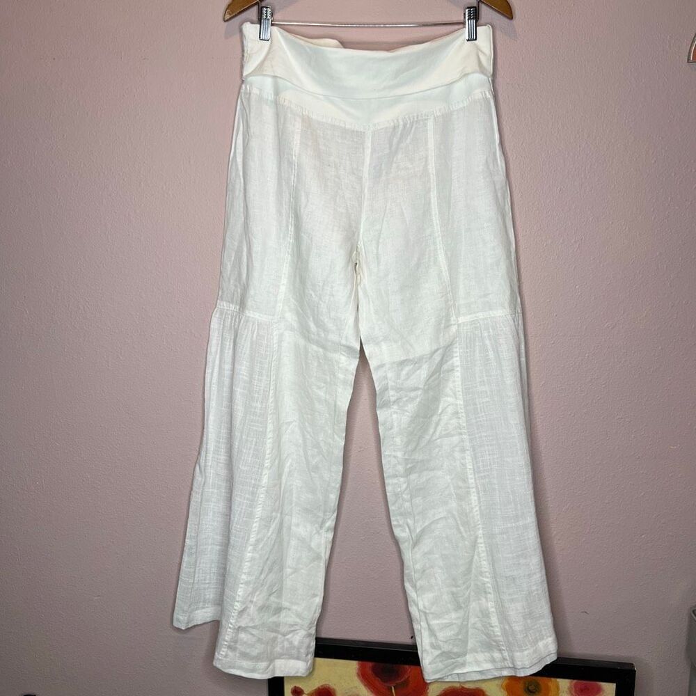 XCVI linen distinct knee-height paneled construction, front panel stitching, and